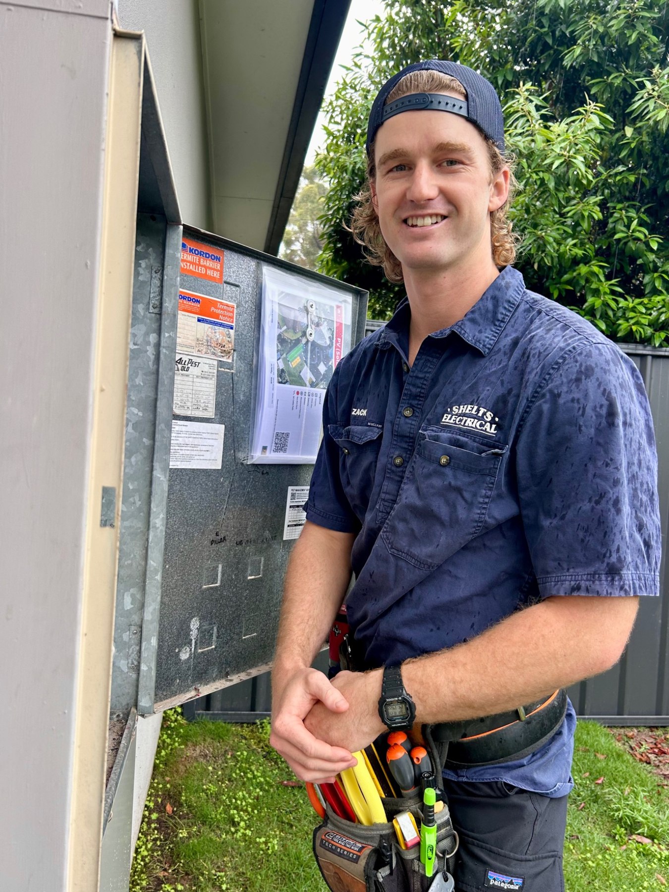 Zack from Shelts Electrical working at a residential switchboard